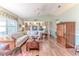 Comfortable living room with built-in shelving and hardwood floors at 2647 Royal Ridge Dr, Spring Hill, FL 34606