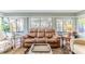 Sun-drenched living room with a view of the backyard at 2647 Royal Ridge Dr, Spring Hill, FL 34606