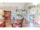 Bright living room with hardwood floors and access to backyard at 2647 Royal Ridge Dr, Spring Hill, FL 34606