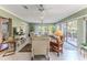 Bright living room with access to a patio at 2647 Royal Ridge Dr, Spring Hill, FL 34606