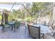 Screened patio with multiple seating areas at 2647 Royal Ridge Dr, Spring Hill, FL 34606