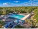 Large community pool with surrounding amenities at 3337 Autumn Amber Dr, Spring Hill, FL 34609