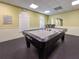 Game room featuring a billiard table for resident enjoyment at 3337 Autumn Amber Dr, Spring Hill, FL 34609