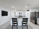 Modern kitchen with stainless steel appliances and granite countertops at 3337 Autumn Amber Dr, Spring Hill, FL 34609
