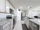 Modern kitchen with stainless steel appliances and granite countertops at 3337 Autumn Amber Dr, Spring Hill, FL 34609