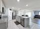 Modern kitchen with stainless steel appliances and granite countertops at 3337 Autumn Amber Dr, Spring Hill, FL 34609
