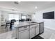 Modern kitchen with stainless steel appliances and granite countertops at 3337 Autumn Amber Dr, Spring Hill, FL 34609