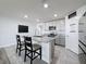 Modern kitchen with stainless steel appliances and granite countertops at 3337 Autumn Amber Dr, Spring Hill, FL 34609