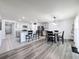 Open concept kitchen with island and breakfast bar seating at 3337 Autumn Amber Dr, Spring Hill, FL 34609