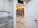 Well-organized pantry with ample shelving for storage at 3337 Autumn Amber Dr, Spring Hill, FL 34609