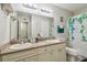 Clean bathroom with double vanity and updated fixtures at 455 Alt 19 S # 163, Palm Harbor, FL 34683