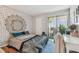 Spacious bedroom with private balcony access and ample closet space at 455 Alt 19 S # 163, Palm Harbor, FL 34683