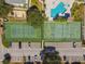 Aerial view of community tennis and pickleball courts at 455 Alt 19 S # 163, Palm Harbor, FL 34683