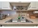 Double sink with granite countertop and modern faucet at 455 Alt 19 S # 163, Palm Harbor, FL 34683