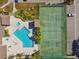 Community pool and pickleball court, top-down view at 455 Alt 19 S # 163, Palm Harbor, FL 34683