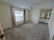 Spacious bedroom with ensuite bathroom and carpet flooring at 5031 6Th N Ave, St Petersburg, FL 33710