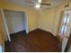 Bedroom with wood flooring and access to a bathroom at 5031 6Th N Ave, St Petersburg, FL 33710