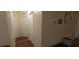 Clean hallway with light walls and wood flooring at 5031 6Th N Ave, St Petersburg, FL 33710