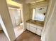 Clean bathroom with vanity, shower, and toilet at 6381 Plantation Rd, Spring Hill, FL 34606