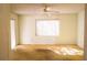 Well-lit bedroom with ceiling fan and carpeted floor at 9256 Antrim St, Spring Hill, FL 34608