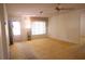 Living room with front entrance and window providing natural light at 9256 Antrim St, Spring Hill, FL 34608