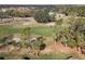 Aerial view of golf course and homes at 9609 Brookdale Dr, New Port Richey, FL 34655