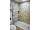 Bathroom with a large shower and marble tile at 20857 Haulover Cv # 3, Lutz, FL 33558