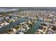 Property view of home and canal with surrounding houses at 3207 Hibiscus Dr, Hernando Beach, FL 34607