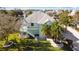 Two-story house with attached garage and backyard access at 3207 Hibiscus Dr, Hernando Beach, FL 34607
