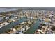 Aerial view of waterfront community with many houses and canals at 3207 Hibiscus Dr, Hernando Beach, FL 34607