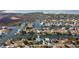 Wide aerial showcasing waterfront home and neighborhood at 3207 Hibiscus Dr, Hernando Beach, FL 34607