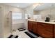 Elegant bathroom with double vanity, soaking tub, and separate shower at 3207 Hibiscus Dr, Hernando Beach, FL 34607