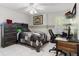 Bedroom with desk, chair, and built-in dresser at 3207 Hibiscus Dr, Hernando Beach, FL 34607