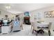Bright dining area with fireplace and plenty of natural light at 3207 Hibiscus Dr, Hernando Beach, FL 34607