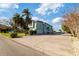Two-story house with attached garage and spacious driveway at 3207 Hibiscus Dr, Hernando Beach, FL 34607