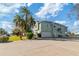 Two story house with attached garage and spacious driveway at 3207 Hibiscus Dr, Hernando Beach, FL 34607