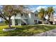 Two-story home with a landscaped yard and waterfront access at 3207 Hibiscus Dr, Hernando Beach, FL 34607