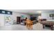 Game room with pool table, seating area, and access to patio at 3207 Hibiscus Dr, Hernando Beach, FL 34607