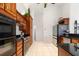 Bright kitchen with stainless steel appliances and ample wood cabinetry at 3207 Hibiscus Dr, Hernando Beach, FL 34607