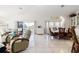 Relaxing living room with wicker chairs and access to patio at 3207 Hibiscus Dr, Hernando Beach, FL 34607