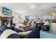Spacious living area featuring a fireplace and comfortable seating at 3207 Hibiscus Dr, Hernando Beach, FL 34607