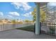 Covered patio with spiral staircase and waterfront view at 3207 Hibiscus Dr, Hernando Beach, FL 34607
