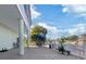 Covered patio overlooking waterfront with seating area at 3207 Hibiscus Dr, Hernando Beach, FL 34607