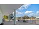 Covered patio overlooking waterfront with seating area at 3207 Hibiscus Dr, Hernando Beach, FL 34607