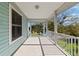 Covered porch with view of the neighborhood at 3207 Hibiscus Dr, Hernando Beach, FL 34607
