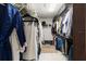 Large walk-in closet with ample shelving and hanging space at 3207 Hibiscus Dr, Hernando Beach, FL 34607