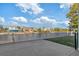 Waterfront view from backyard with fence and dock at 3207 Hibiscus Dr, Hernando Beach, FL 34607