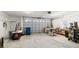Large workshop with ample storage and workbenches at 3207 Hibiscus Dr, Hernando Beach, FL 34607
