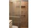 Updated bathroom with a shower and tile surround at 3518 Moog Rd, Holiday, FL 34691