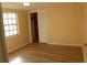 Bedroom with wood-look floors and built-in shelving at 3518 Moog Rd, Holiday, FL 34691